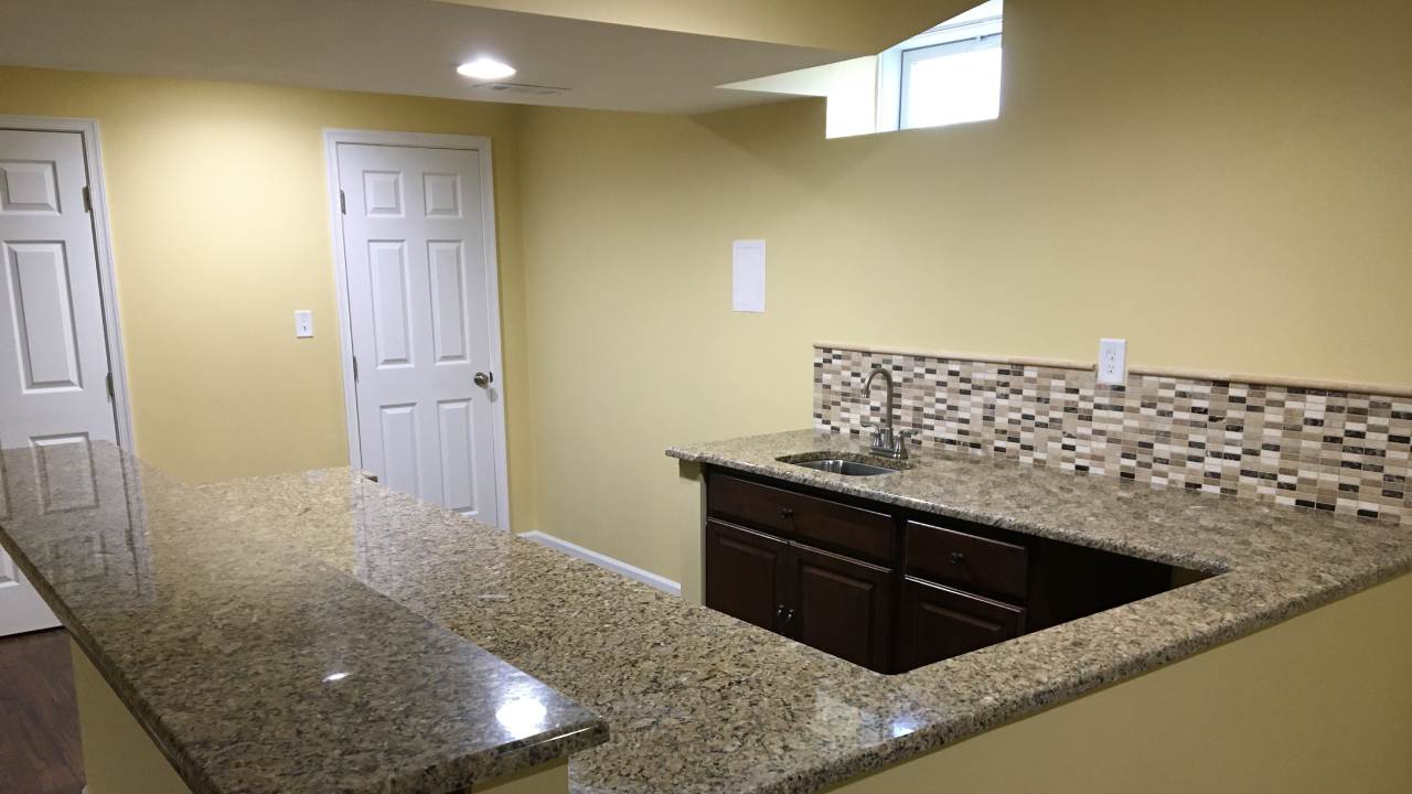 Finished basement living space after complete renovation